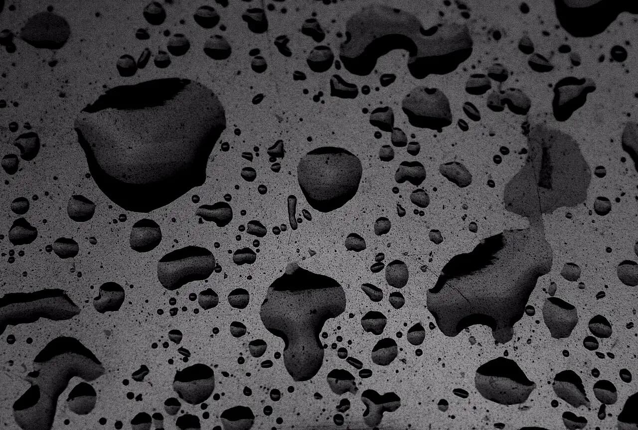 Water beading on sealed dark stone
